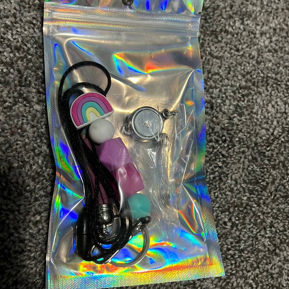 Lanyard with retractable badge holder